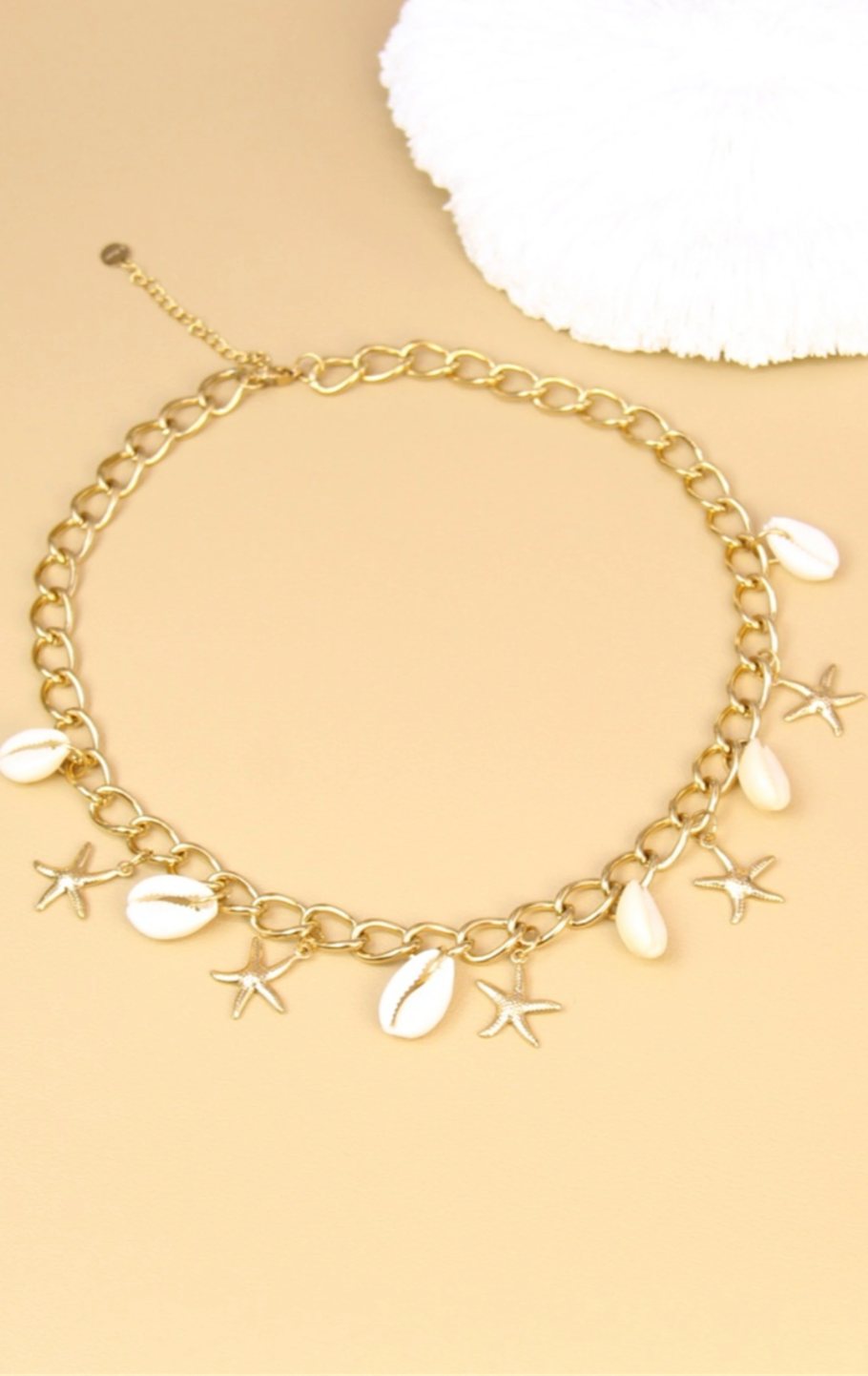 Collier doré coquillages et étoiles de mer