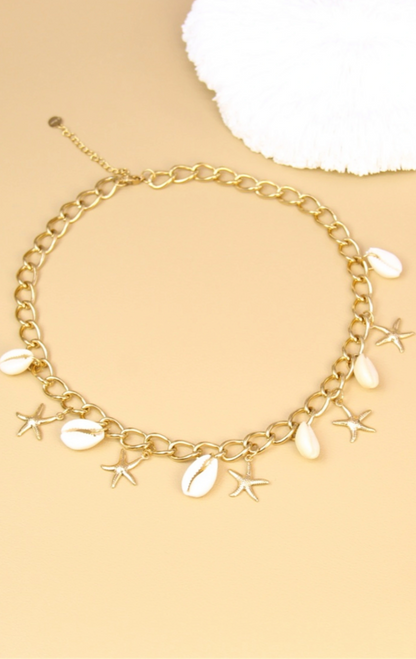 Collier doré coquillages et étoiles de mer