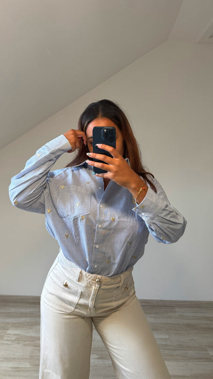 Chemisier bleu avec cœurs dorés