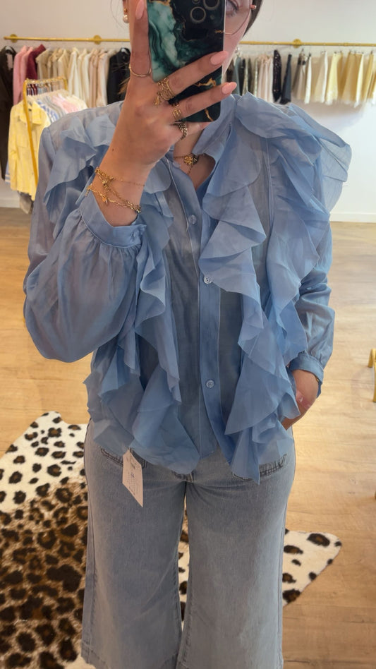Chemisier bleu à volants