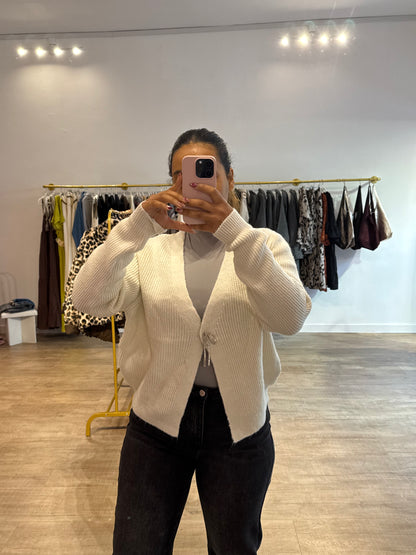 Gilet blanc avec détail nœud argenté