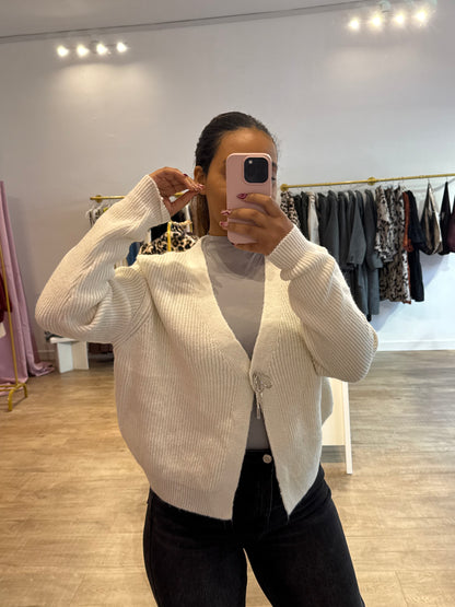 Gilet blanc avec détail nœud argenté