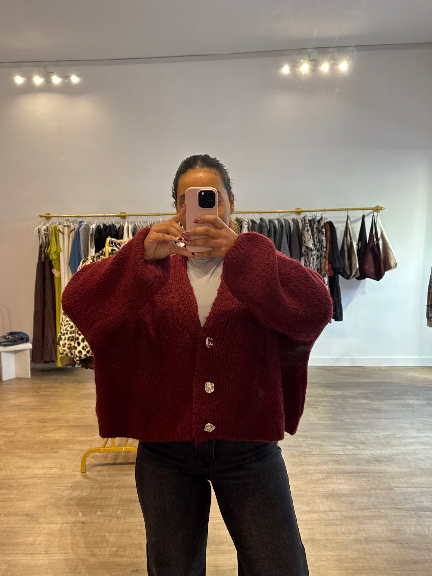 Gilet bordeaux à boutons dorés