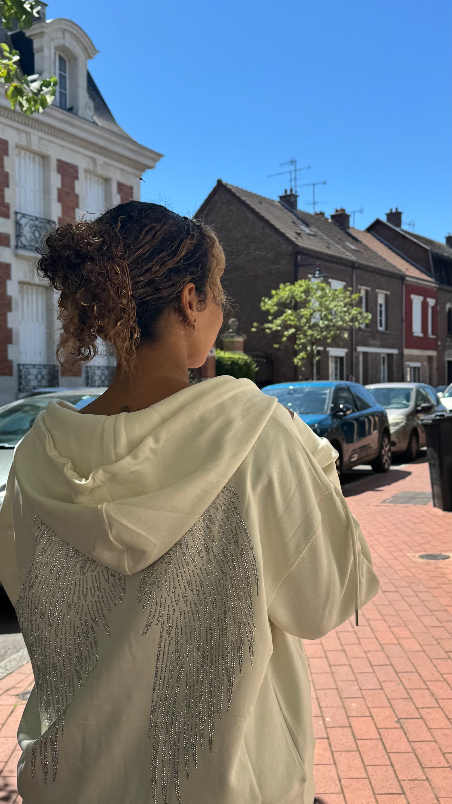 Veste motif ailes à strass