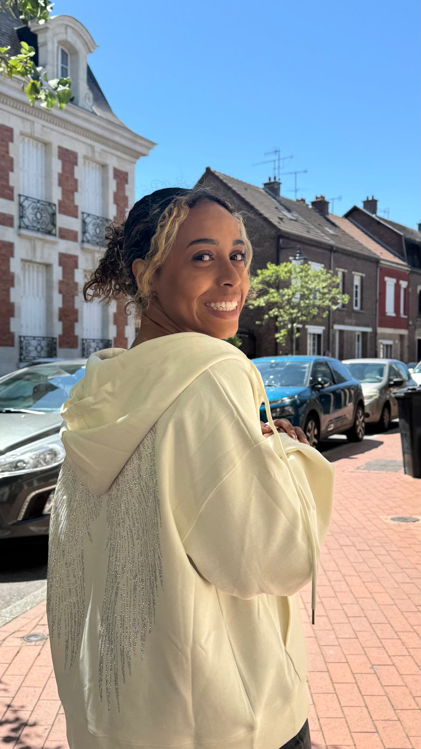 Veste motif ailes à strass