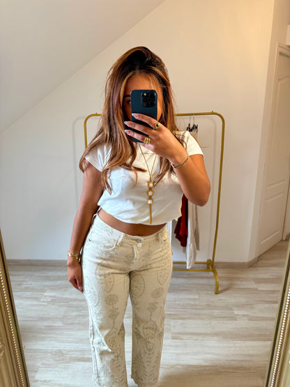Pantalon à broderies dorées